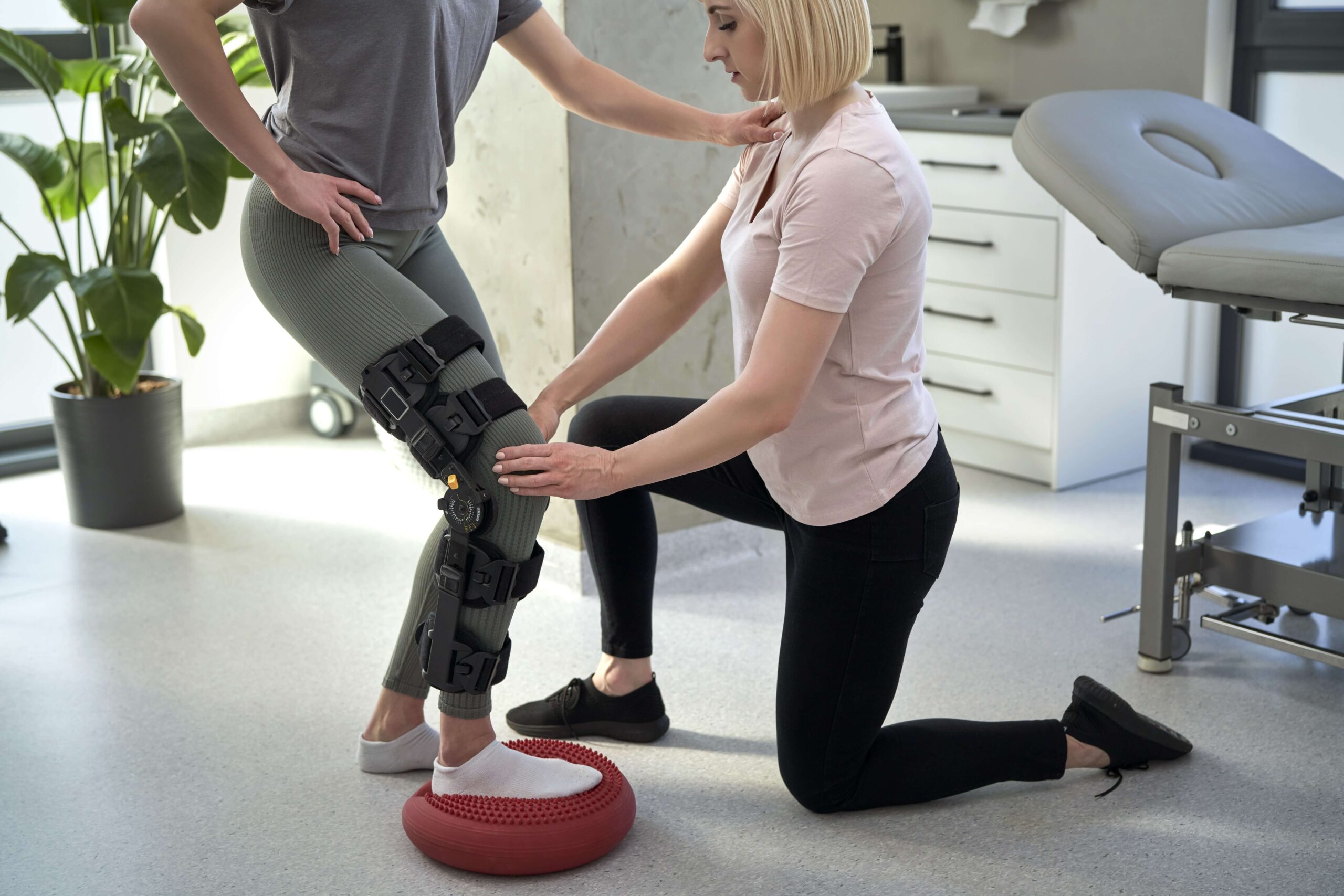 caucasian-woman-with-orthosis-working-with-physical